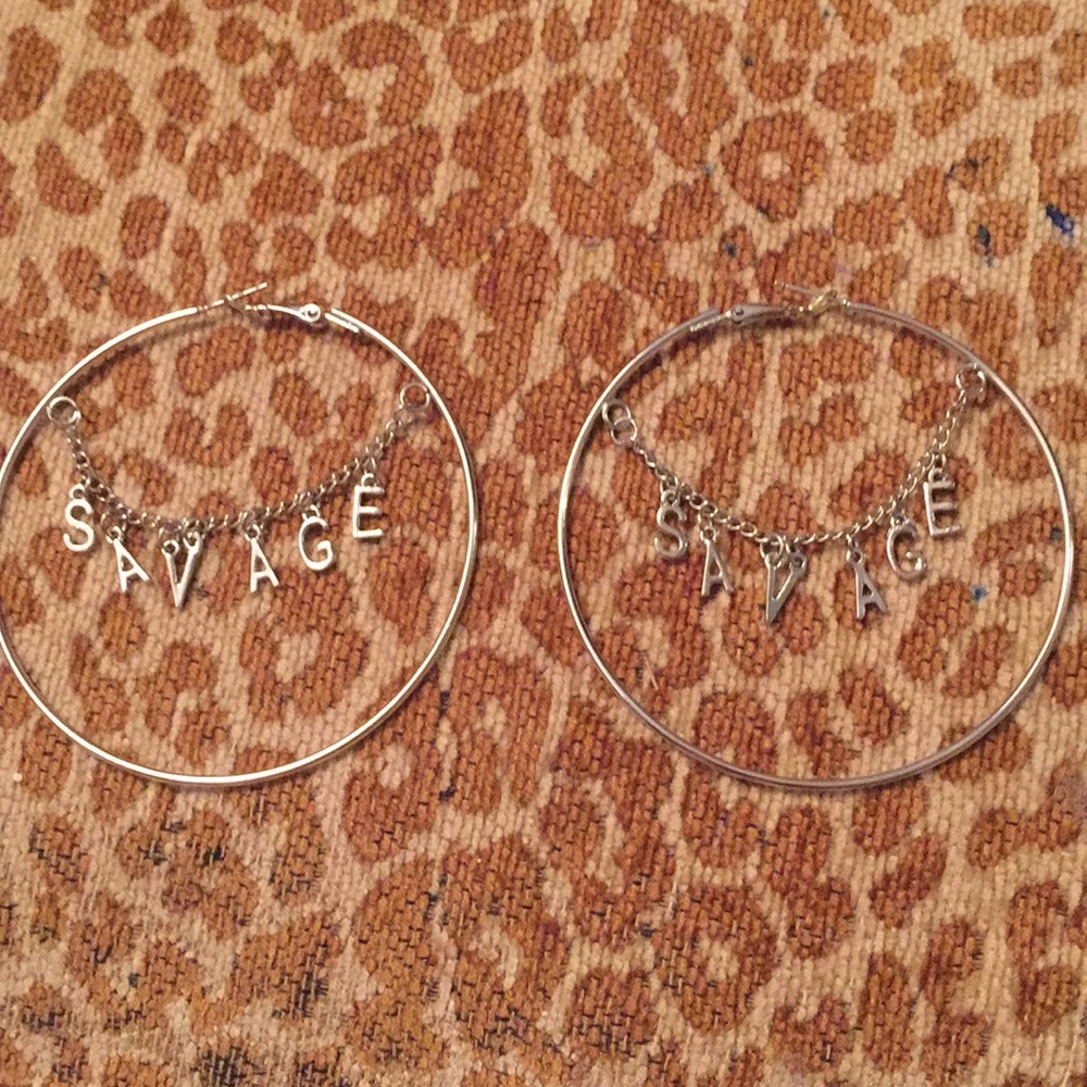 “Savage” hoop earrings Hot Topic
